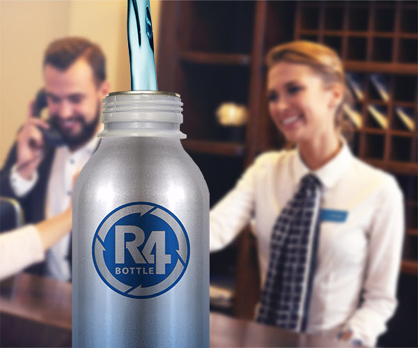 Complimentary Aluminum R4 Bottles Given out at Hotel Reception Desk for Self-serve Hydration Stations.